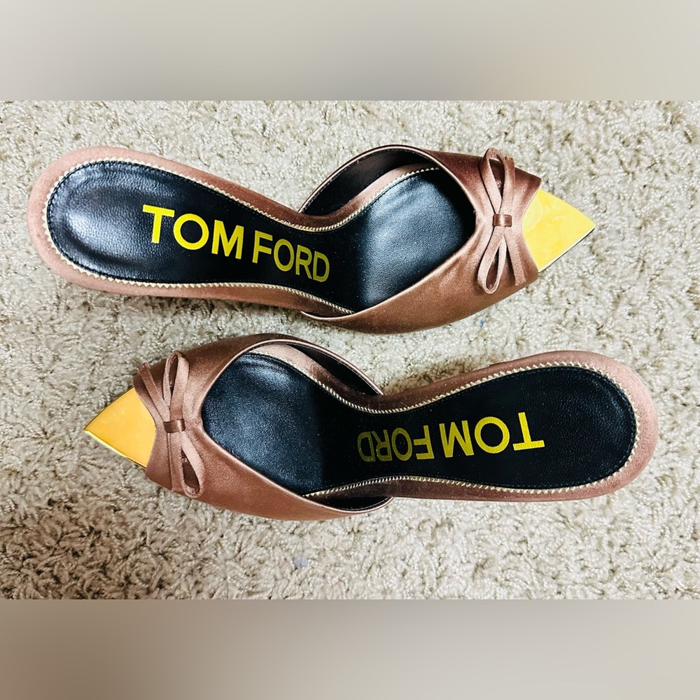 Tom Ford brown bow accent mules with gold heels. Size 39
